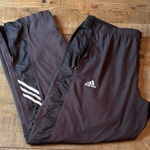 Men's Adidas blk Track Pants with White Stripes. See pics for any imperfection